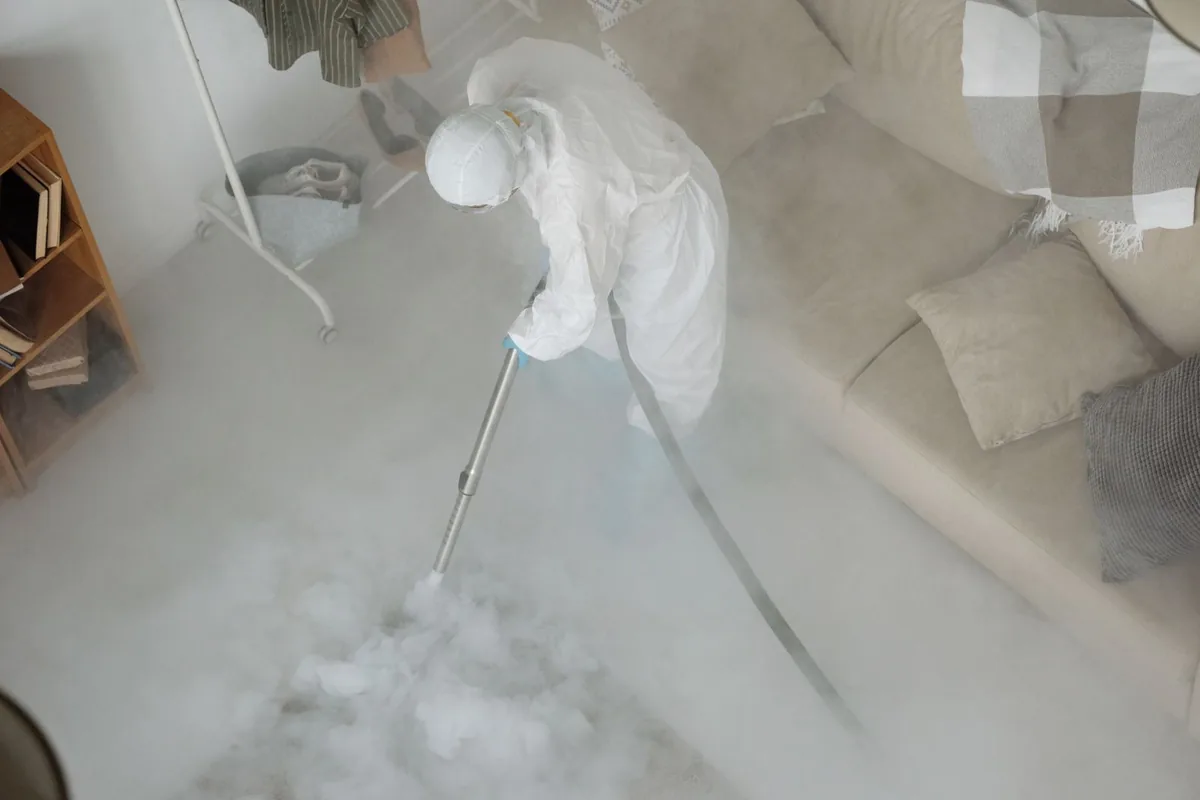 Biohazard cleanup technician in protective equipment, Frankenmuth, MI